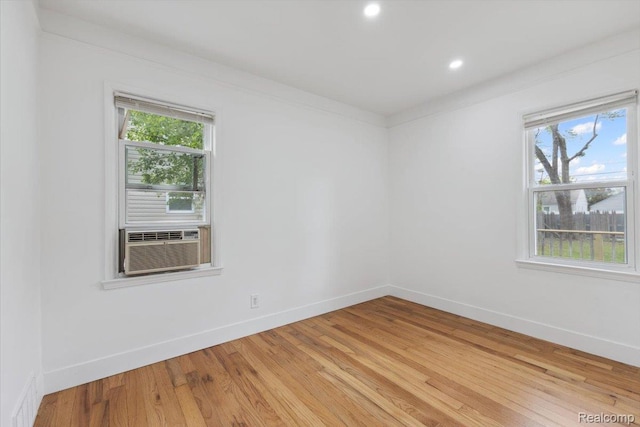 3625 Ellwood Ave, Birmingham, MI 48072 - unfurnished room featuring plenty of natural light, light wood-style floors, baseboards, and recessed lighting