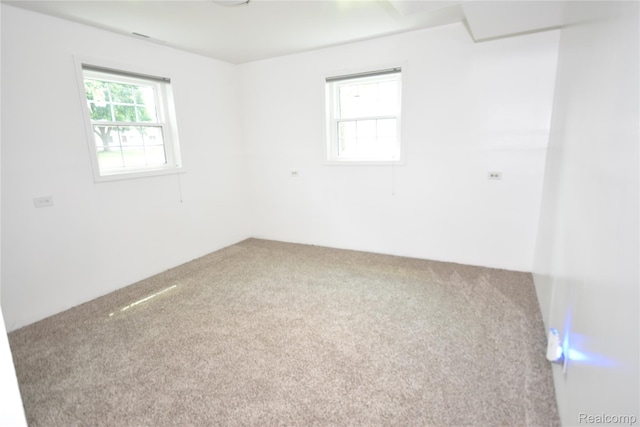 1150 E Hill Rd, Grand Blanc, MI 48439 - spare room with carpet