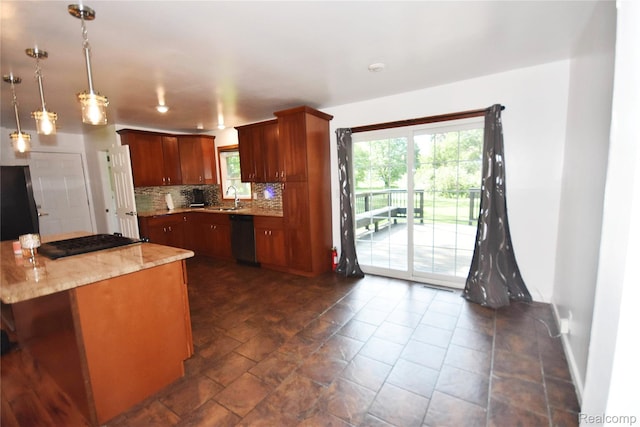 1150 E Hill Rd, Grand Blanc, MI 48439 - kitchen with dishwasher, gas cooktop, healthy amount of natural light, and backsplash