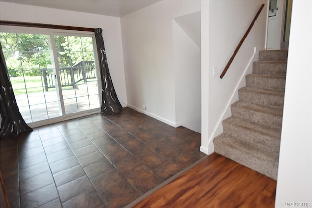 1150 E Hill Rd, Grand Blanc, MI 48439 - unfurnished room with stairway and baseboards