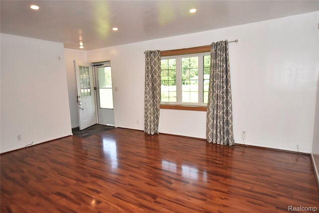 1150 E Hill Rd, Grand Blanc, MI 48439 - empty room featuring wood finished floors and recessed lighting
