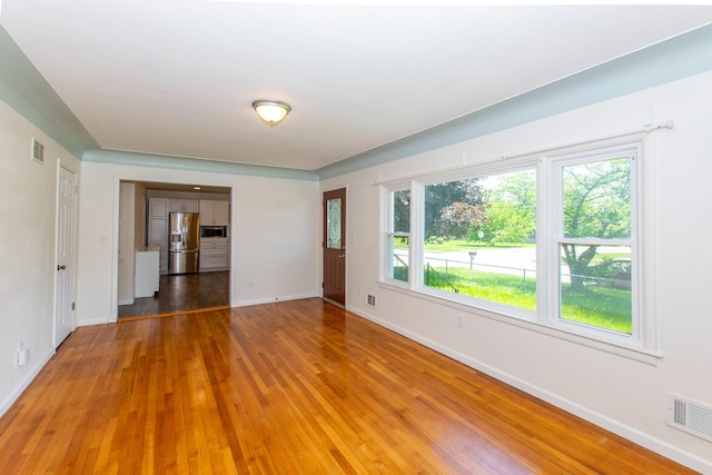 4225 Central Blvd, Ann Arbor, MI 48108 - empty room with baseboards and light wood finished floors