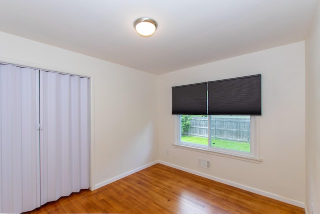 4225 Central Blvd, Ann Arbor, MI 48108 - empty room with wood finished floors and baseboards