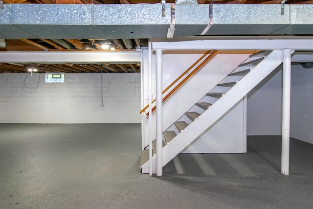 4225 Central Blvd, Ann Arbor, MI 48108 - below grade area featuring concrete block wall and stairway