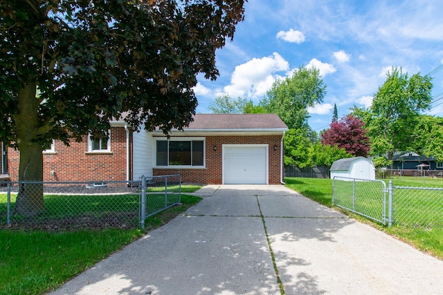 4225 Central Blvd, Ann Arbor, MI 48108 - view of front facade with a garage, driveway, and brick siding