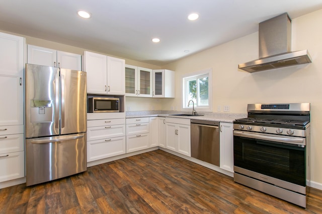 4225 Central Blvd, Ann Arbor, MI 48108 - kitchen with appliances with stainless steel finishes, wall chimney exhaust hood, dark wood-style flooring, white cabinetry, and glass insert cabinets