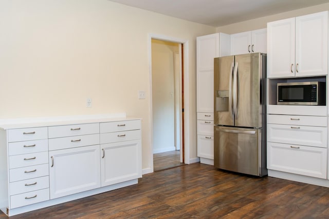 4225 Central Blvd, Ann Arbor, MI 48108 - kitchen with appliances with stainless steel finishes, white cabinetry, dark wood-style floors, and light countertops
