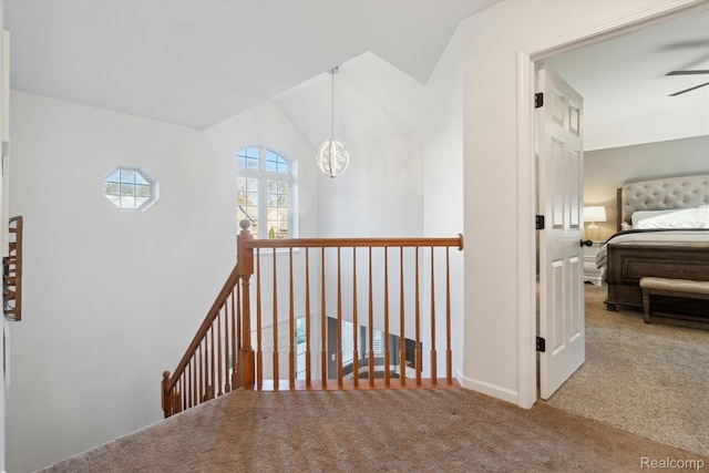 177 Summer Shade Dr, Howell, MI 48843 - hall with an upstairs landing, vaulted ceiling, carpet, a chandelier, and baseboards