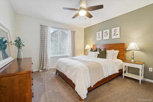 177 Summer Shade Dr, Howell, MI 48843 - carpeted bedroom featuring baseboards and ceiling fan