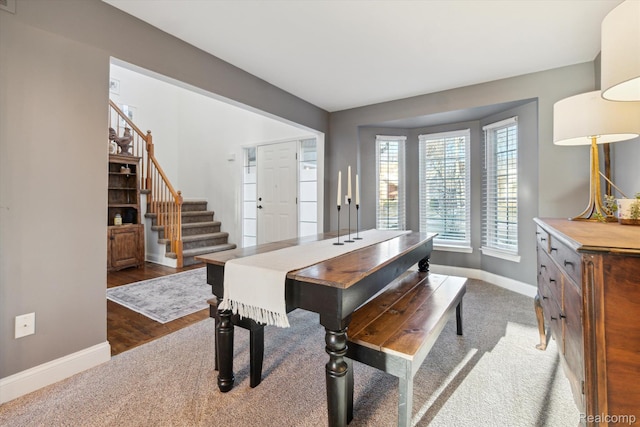 177 Summer Shade Dr, Howell, MI 48843 - dining space featuring baseboards and stairs