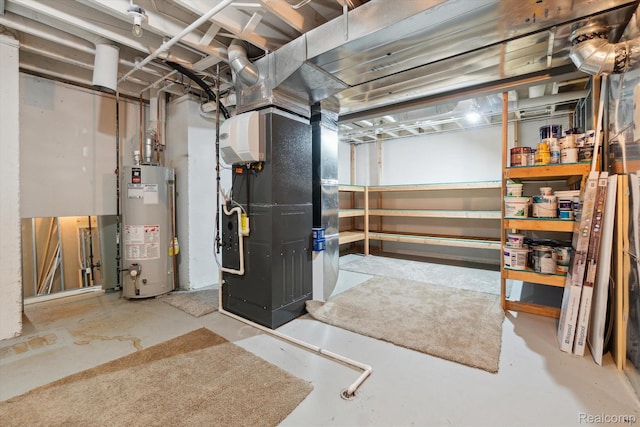 177 Summer Shade Dr, Howell, MI 48843 - unfinished basement featuring gas water heater and heating unit