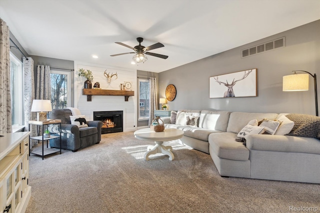 177 Summer Shade Dr, Howell, MI 48843 - living room featuring carpet, ceiling fan, a large fireplace, and recessed lighting