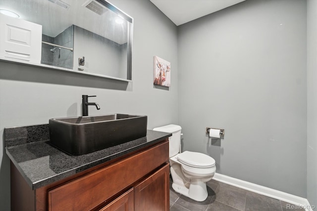 177 Summer Shade Dr, Howell, MI 48843 - bathroom featuring toilet, baseboards, vanity, a shower, and tile patterned flooring