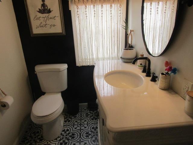 429 N Chipman St, Owosso, MI 48867 - bathroom with toilet and vanity