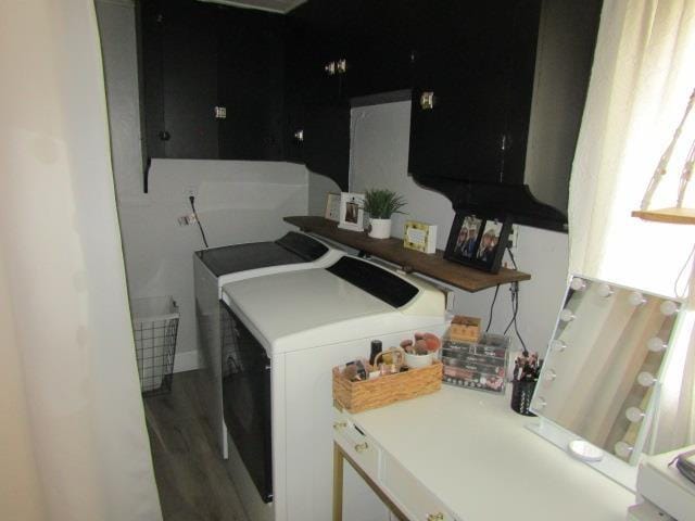 429 N Chipman St, Owosso, MI 48867 - laundry area with washing machine and dryer and wood finished floors