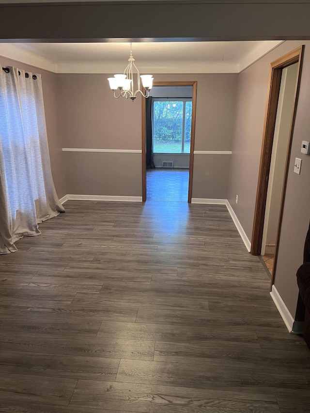 18830 San Quentin Dr, Lathrup Village, MI 48076 - unfurnished dining area with dark wood-style flooring, a chandelier, and baseboards