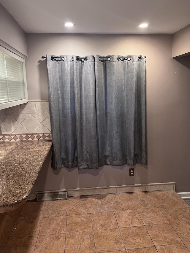 18830 San Quentin Dr, Lathrup Village, MI 48076 - bathroom featuring recessed lighting and decorative backsplash