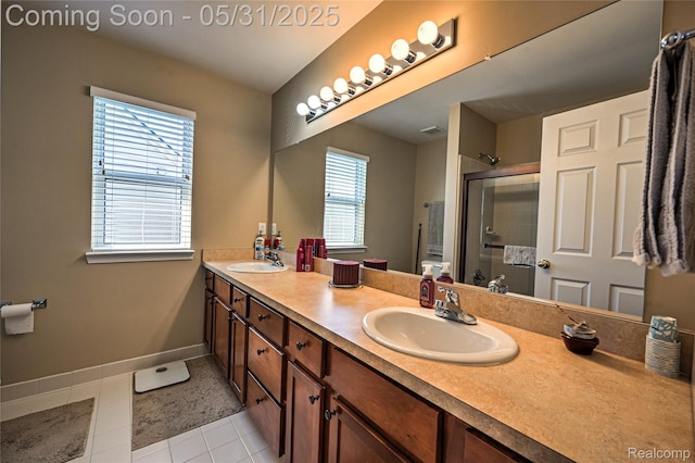28329 Cottage Ln, New Hudson, MI 48165 - bathroom with double vanity, tile patterned floors, a shower stall, and baseboards