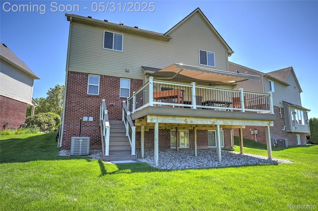 28329 Cottage Ln, New Hudson, MI 48165 - rear view of house with a deck, a yard, stairs, and central air condition unit