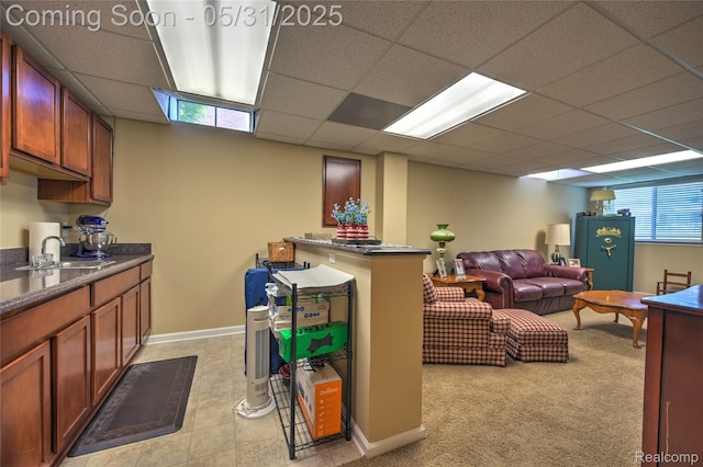28329 Cottage Ln, New Hudson, MI 48165 - living area with a drop ceiling and baseboards
