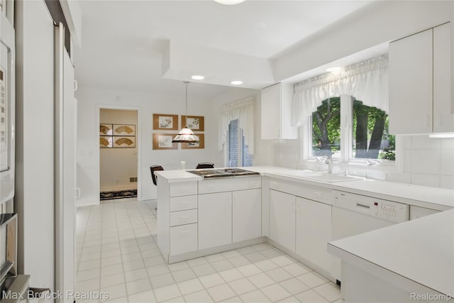 1816 Ledbury Dr, Bloomfield Hills, MI 48304 - kitchen with a sink, tasteful backsplash, light tile patterned floors, a peninsula, and recessed lighting