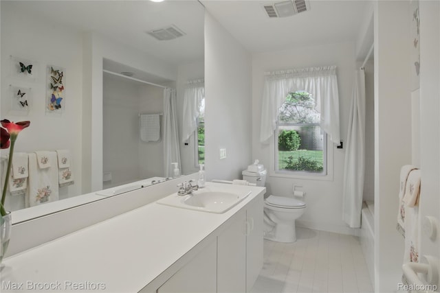1816 Ledbury Dr, Bloomfield Hills, MI 48304 - full bathroom featuring vanity, toilet, shower / bathtub combination with curtain, baseboards, and tile patterned floors