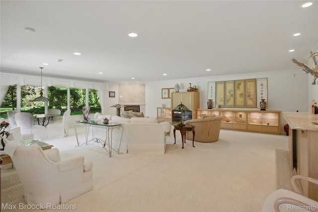 1816 Ledbury Dr, Bloomfield Hills, MI 48304 - living area with crown molding, light carpet, recessed lighting, and a fireplace