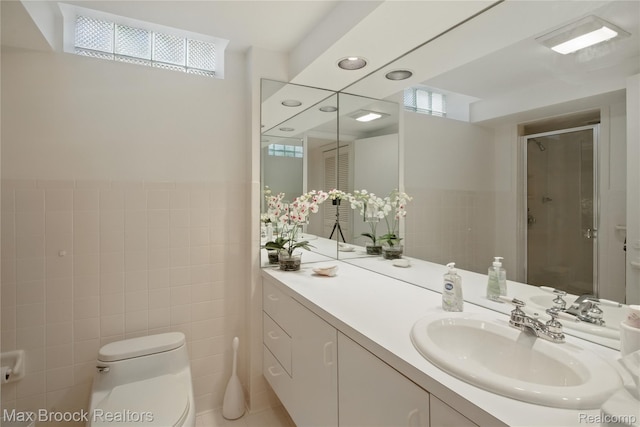1816 Ledbury Dr, Bloomfield Hills, MI 48304 - full bath with toilet, vanity, a stall shower, and tile walls