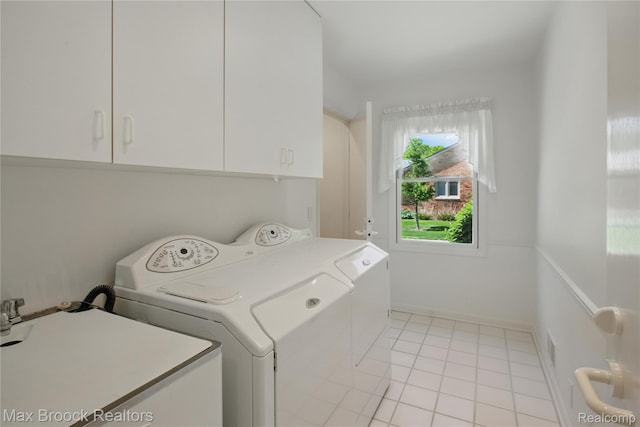 1816 Ledbury Dr, Bloomfield Hills, MI 48304 - washroom featuring cabinet space, washer and clothes dryer, and light tile patterned flooring