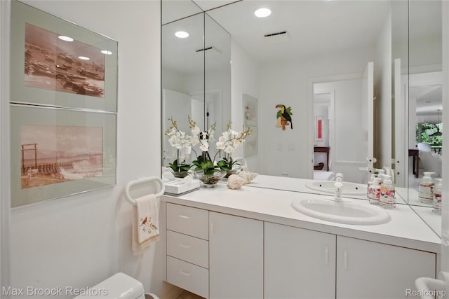 1816 Ledbury Dr, Bloomfield Hills, MI 48304 - bathroom featuring vanity, recessed lighting, and toilet