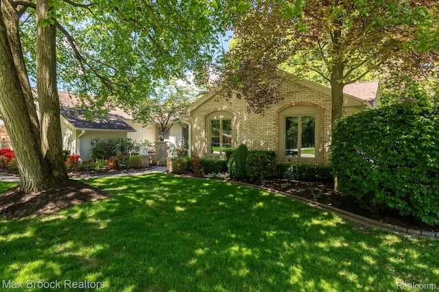 1816 Ledbury Dr, Bloomfield Hills, MI 48304 - view of front of home with brick siding and a front lawn