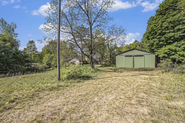 5901 Sweeter Rd, Twin Lake, MI 49457 - view of yard with a pole building and an outdoor structure