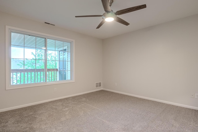 157 Hunters Ln NE, Rockford, MI 49341 - carpeted spare room featuring a ceiling fan and baseboards