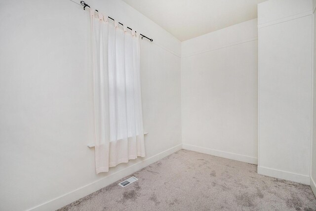 723 Baxter St SE, Grand Rapids, MI 49503 - unfurnished room with carpet flooring and baseboards