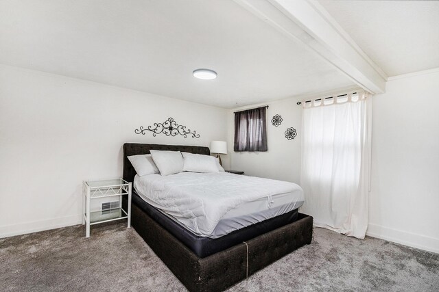 723 Baxter St SE, Grand Rapids, MI 49503 - carpeted bedroom featuring baseboards and beam ceiling