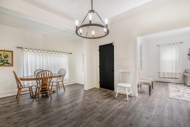 723 Baxter St SE, Grand Rapids, MI 49503 - dining area featuring a chandelier, wood finished floors, ornamental molding, and baseboards