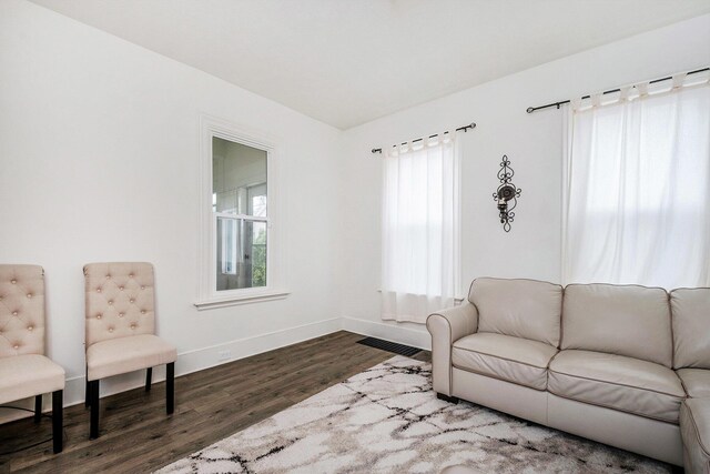 723 Baxter St SE, Grand Rapids, MI 49503 - living area featuring wood finished floors and baseboards