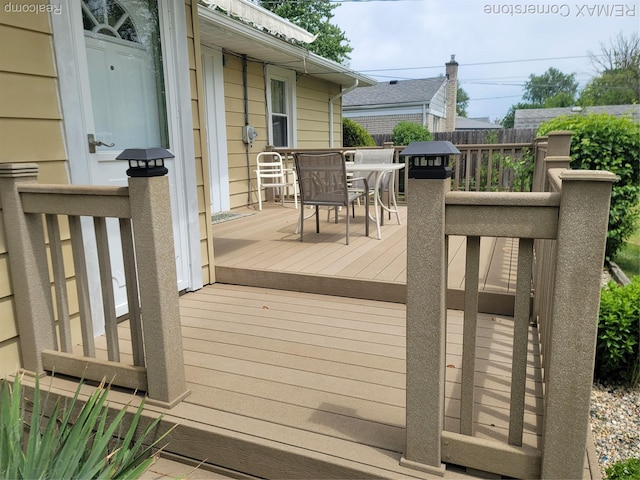 29751 Balmoral St, Garden City, MI 48135 - wooden deck with outdoor dining space