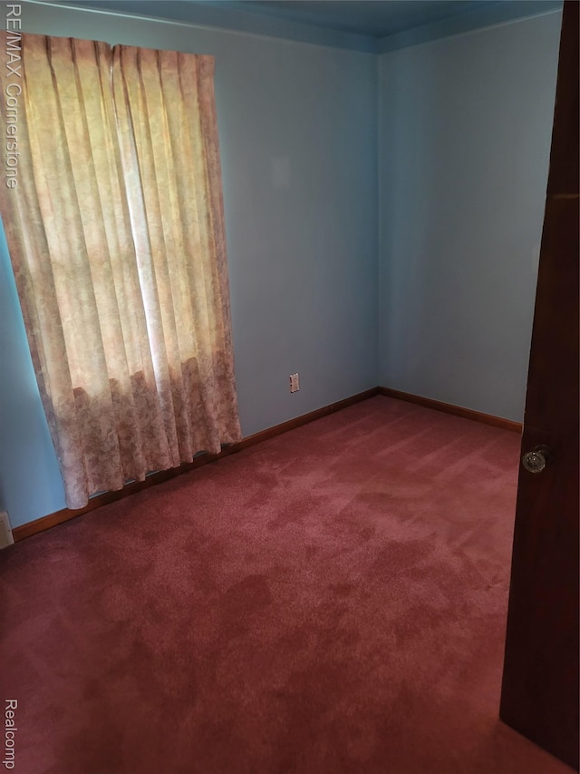 29751 Balmoral St, Garden City, MI 48135 - carpeted empty room featuring baseboards