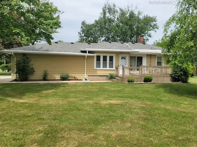 29751 Balmoral St, Garden City, MI 48135 - ranch-style house with a chimney, a front lawn, a wooden deck, and a shingled roof