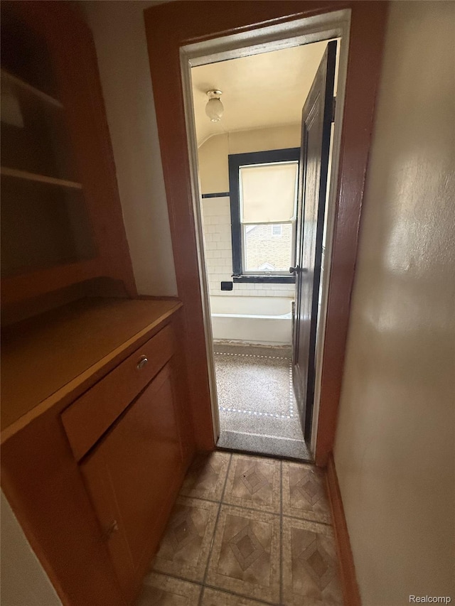 8071 Elgin St, Detroit, MI 48234 - corridor featuring light floors