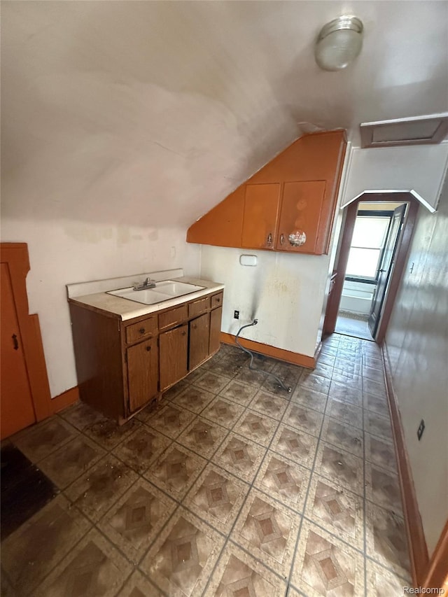 8071 Elgin St, Detroit, MI 48234 - laundry room featuring a sink and baseboards
