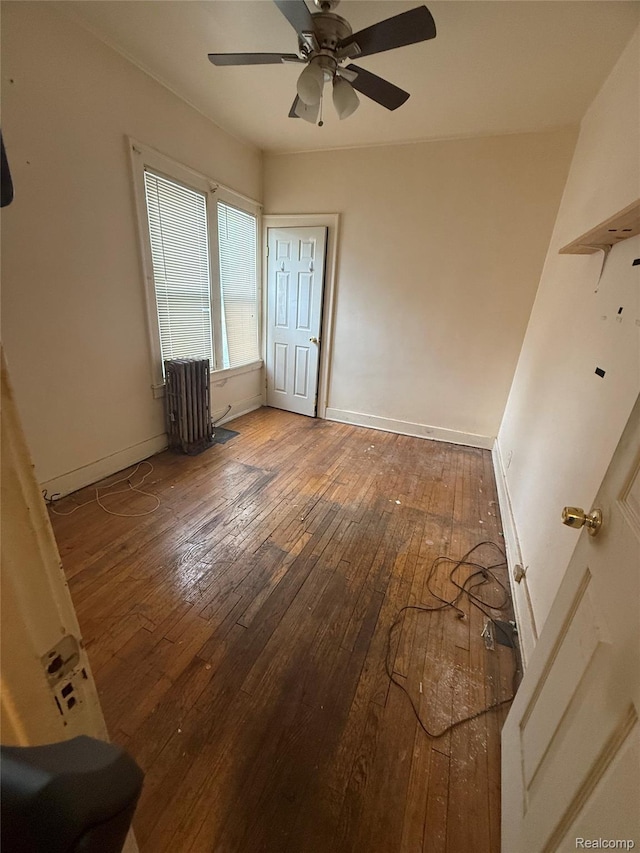 8071 Elgin St, Detroit, MI 48234 - empty room featuring hardwood / wood-style floors, a ceiling fan, and baseboards