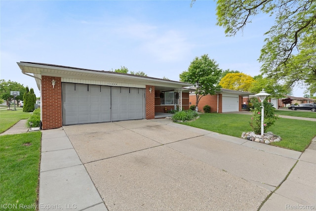 11498 Racine Rd, Warren, MI 48093 - single story home featuring brick siding, a front yard, an attached garage, and concrete driveway