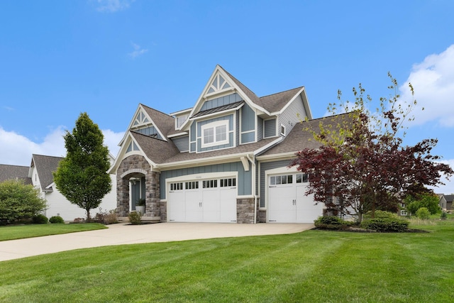 1506 Providence Cove Ct, Byron Center, MI 49315 - view of front facade with board and batten siding, a front yard, stone siding, and driveway
