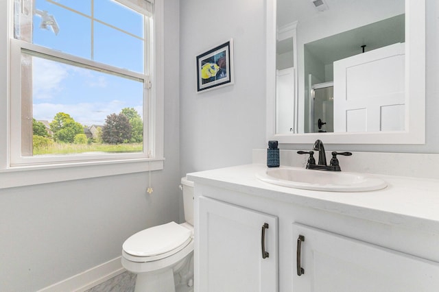 1506 Providence Cove Ct, Byron Center, MI 49315 - full bath featuring plenty of natural light, vanity, toilet, and a shower with shower door