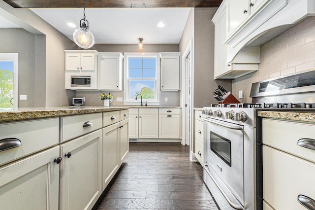1506 Providence Cove Ct, Byron Center, MI 49315 - kitchen with stainless steel appliances, dark wood finished floors, recessed lighting, white cabinetry, and decorative backsplash