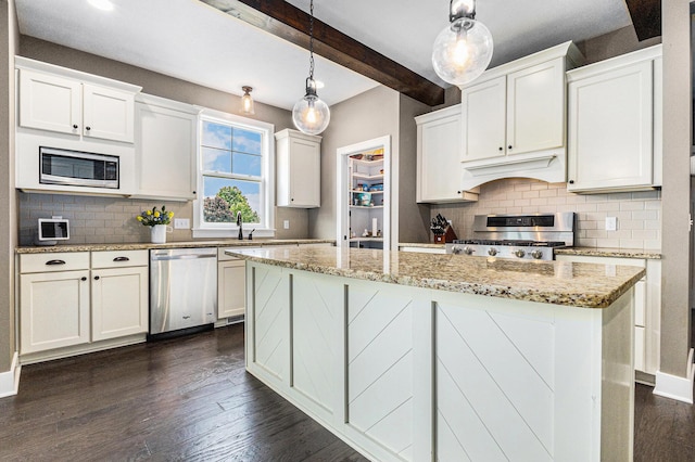1506 Providence Cove Ct, Byron Center, MI 49315 - kitchen with stainless steel appliances, beam ceiling, tasteful backsplash, a center island, and white cabinetry