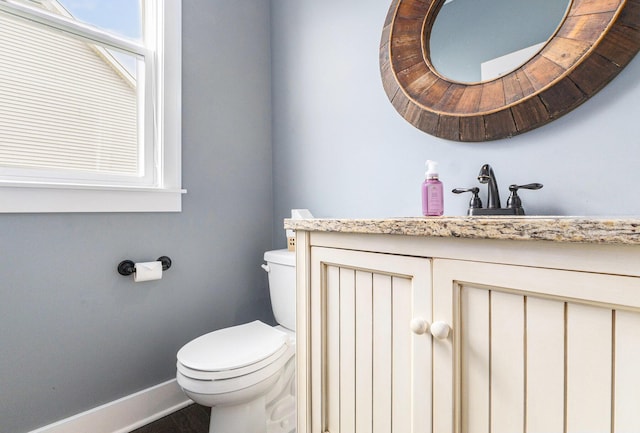 1506 Providence Cove Ct, Byron Center, MI 49315 - half bath with toilet, baseboards, vanity, and wood finished floors