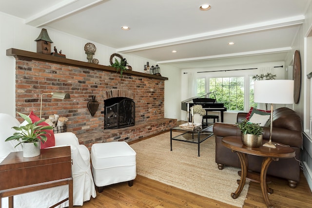 647 S Spinningwheel Ln, Michigan, MI 48304 - living area featuring beam ceiling, wood finished floors, a fireplace, and recessed lighting